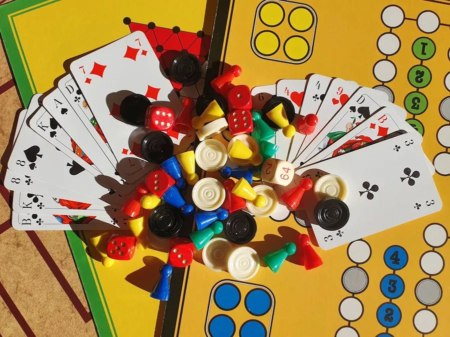 Ilustrasi mimpi bermain bekel — a close up of a bunch of buttons on a table