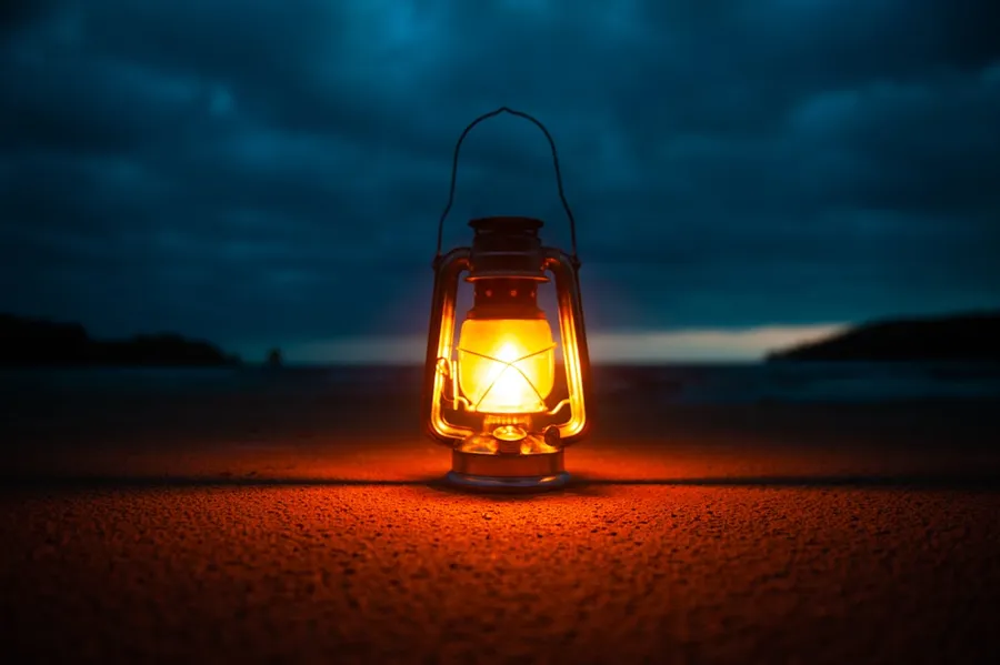Ilustrasi mimpi petromak — lighted kerosene lantern -